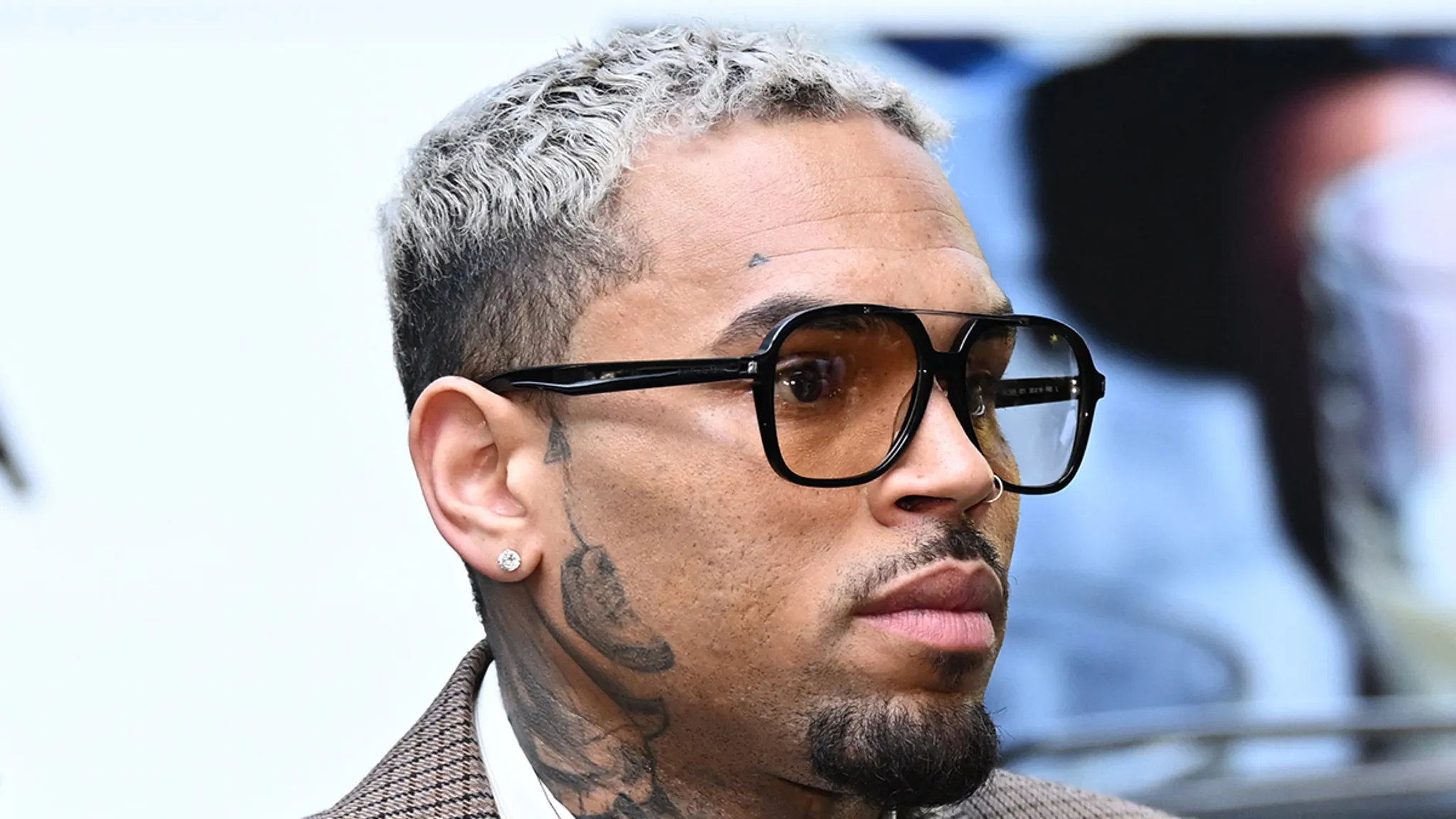 Chris Brown performing live on stage during a concert tour