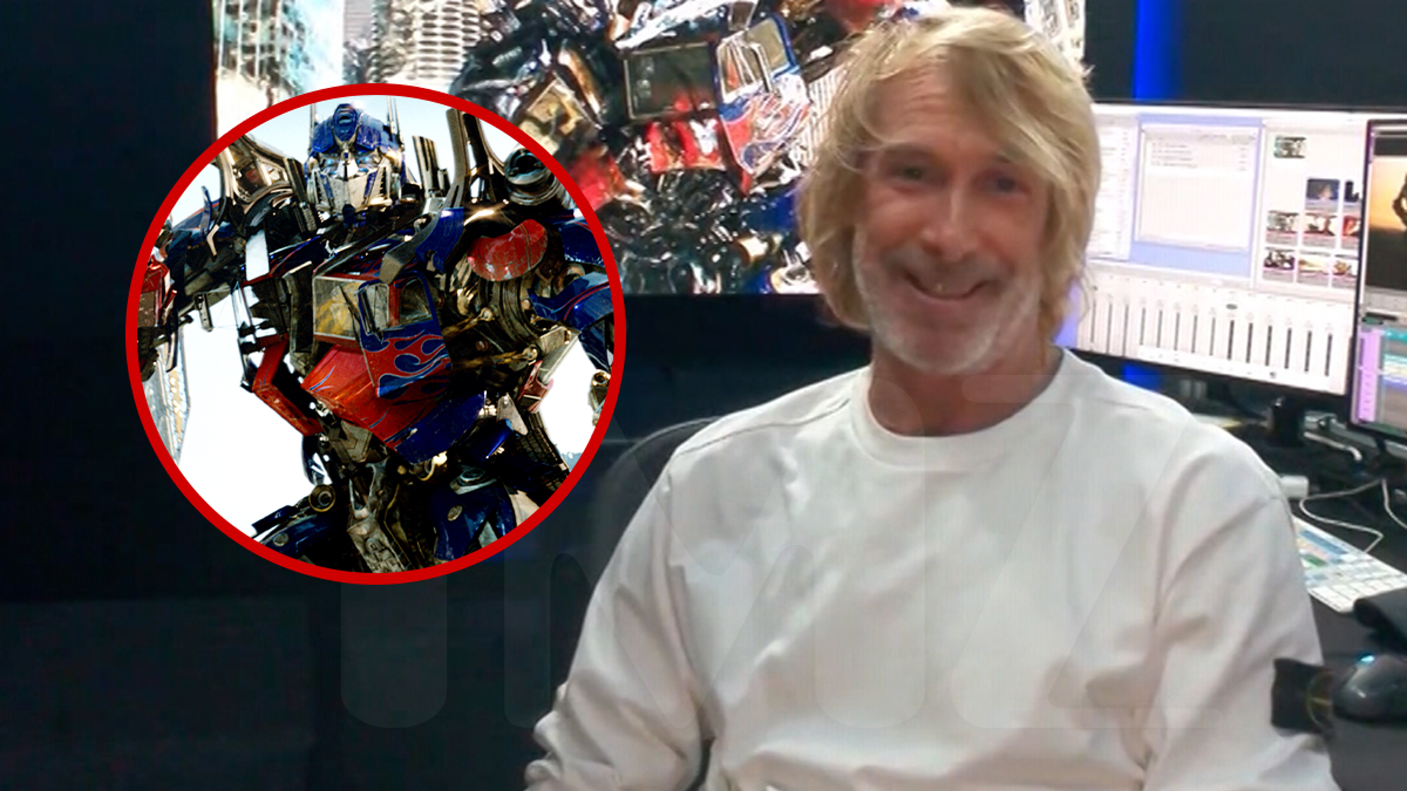 Director Michael Bay looking thoughtful at a public movie premiere event