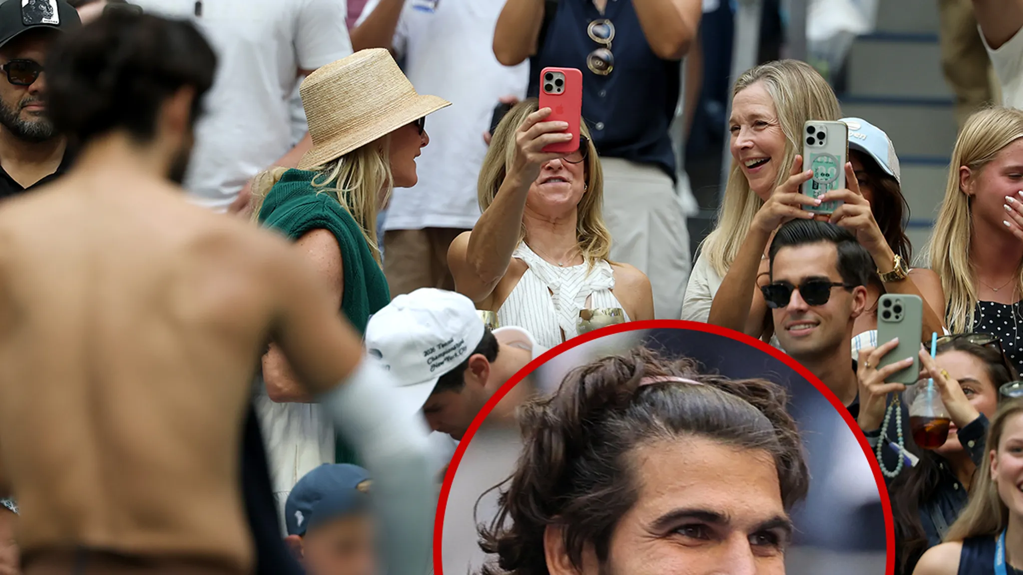 Carlos Alcaraz taking off his shirt on the sidelines during a match at the US Open
