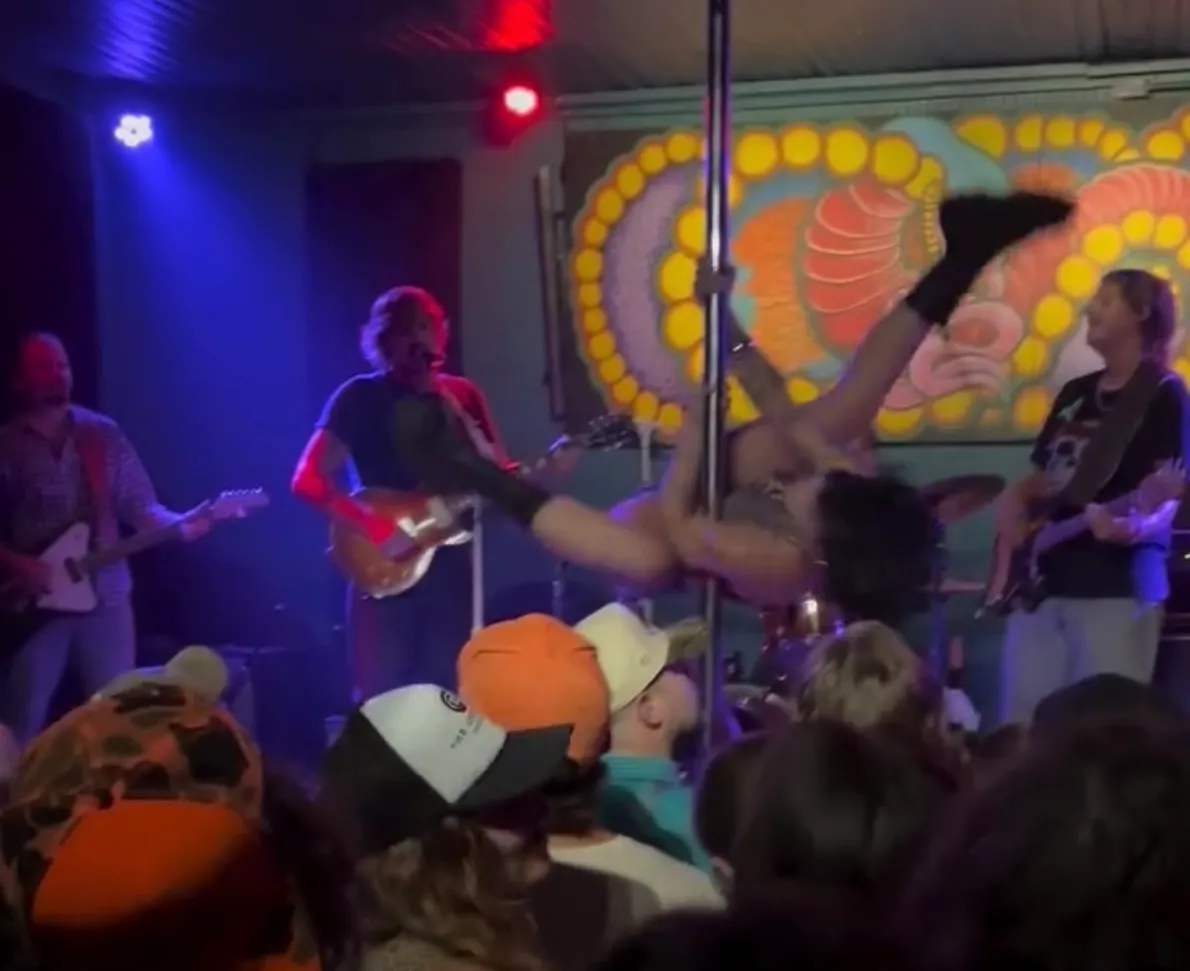 Sturgill Simpson performing on stage during a secret concert