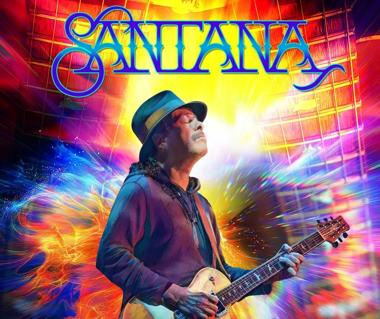 Carlos Santana performing live on stage with a guitar