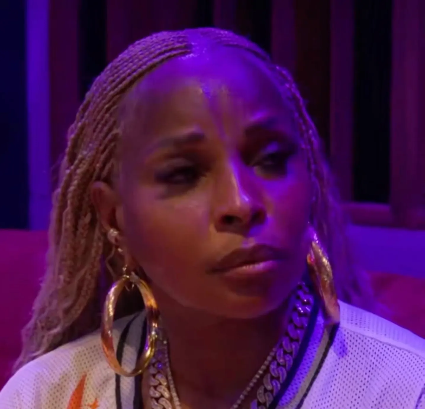 Mary J. Blige attending a high-profile red carpet event in a glamorous outfit.