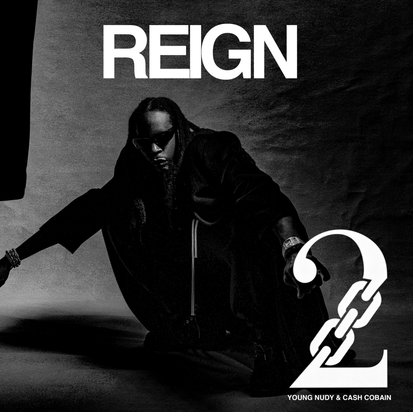 2 Chainz, Cash Cobain, and Young Nudy pose together for their single Reign