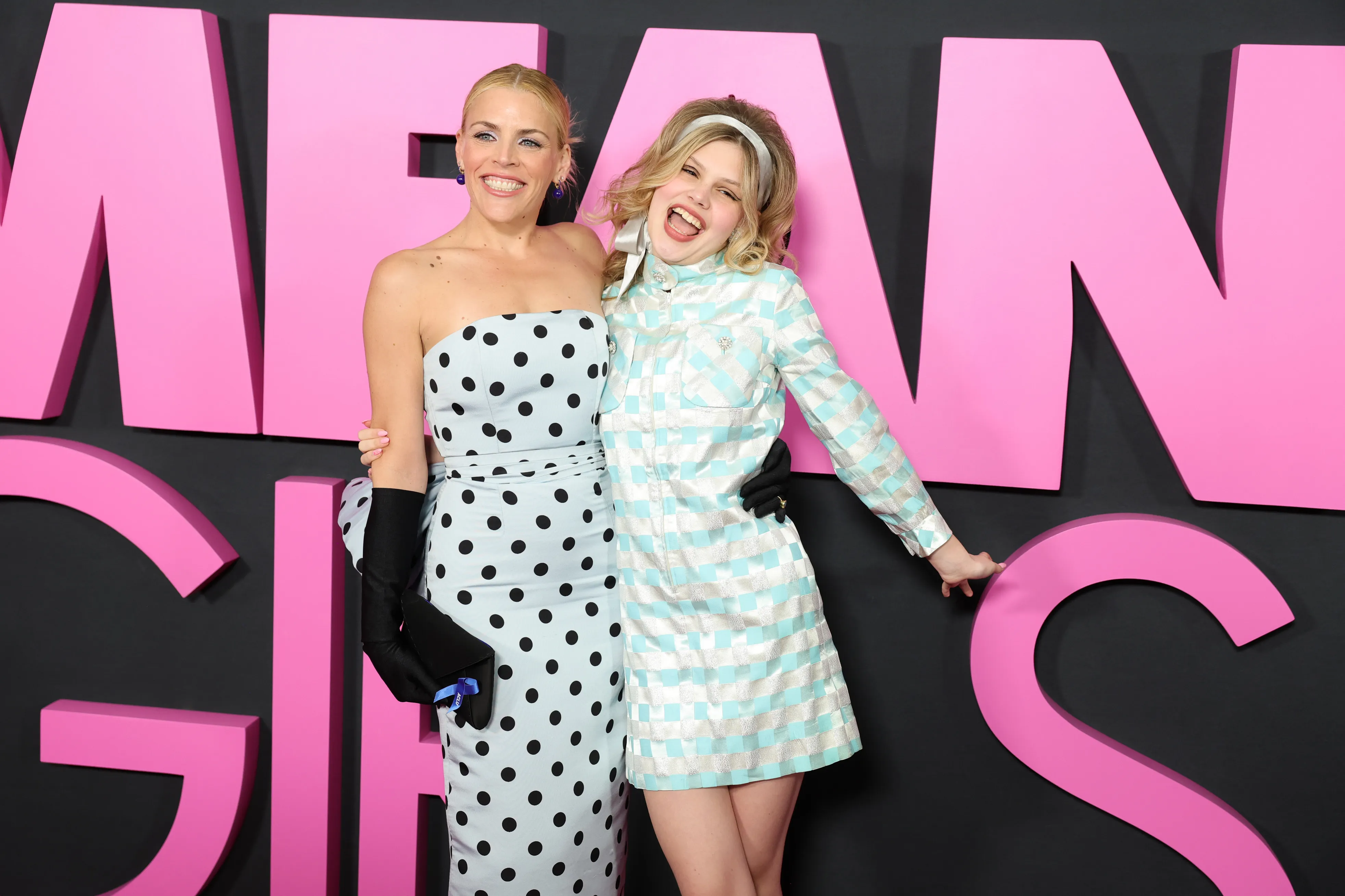 Busy Philipps and Birdie Silverstein posing at the "Mean Girls" premiere.