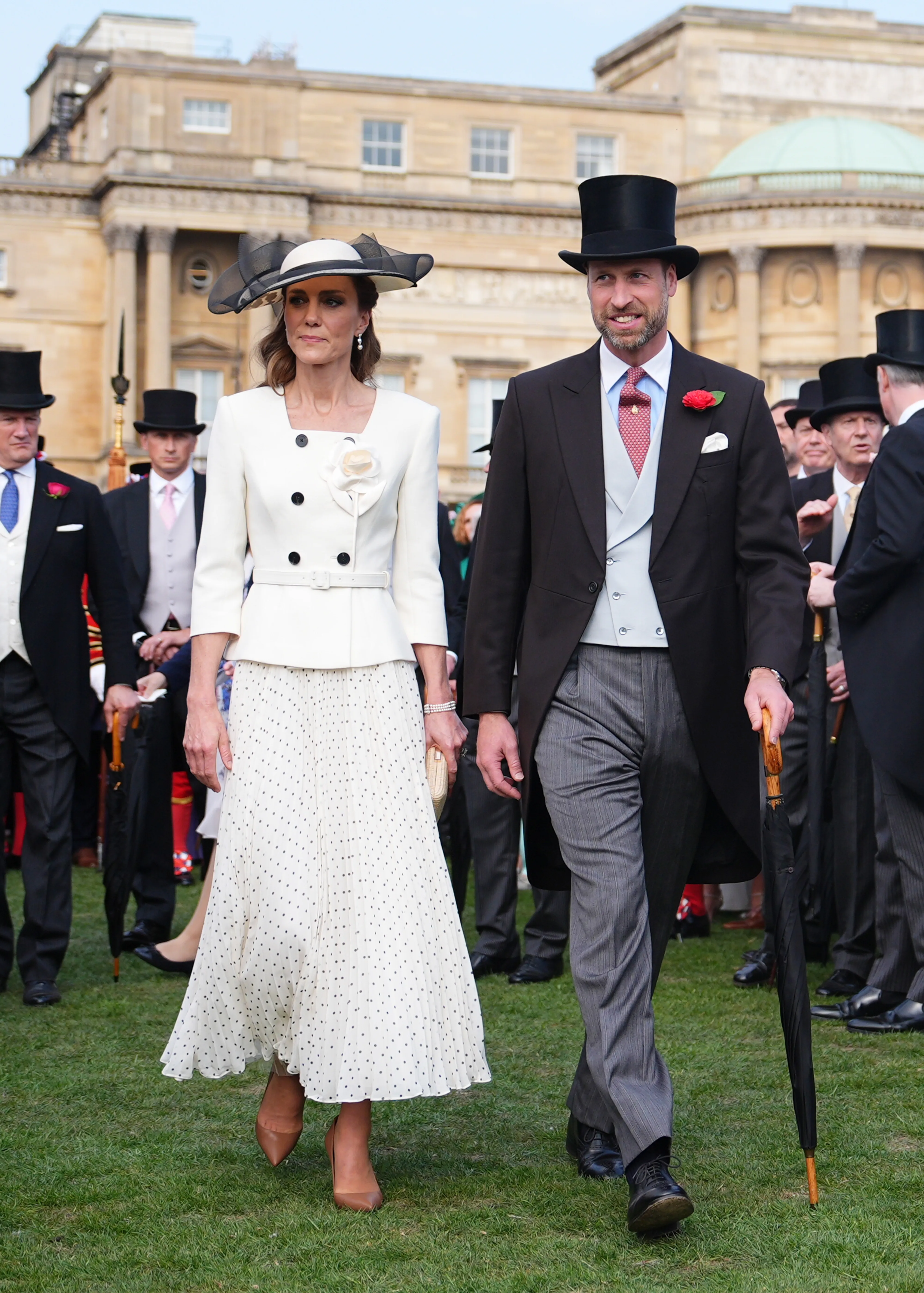 Catherine, Princess of Wales, and Prince William, Prince of Wales, attend a Royal Garden Party at Buckingham Palace.