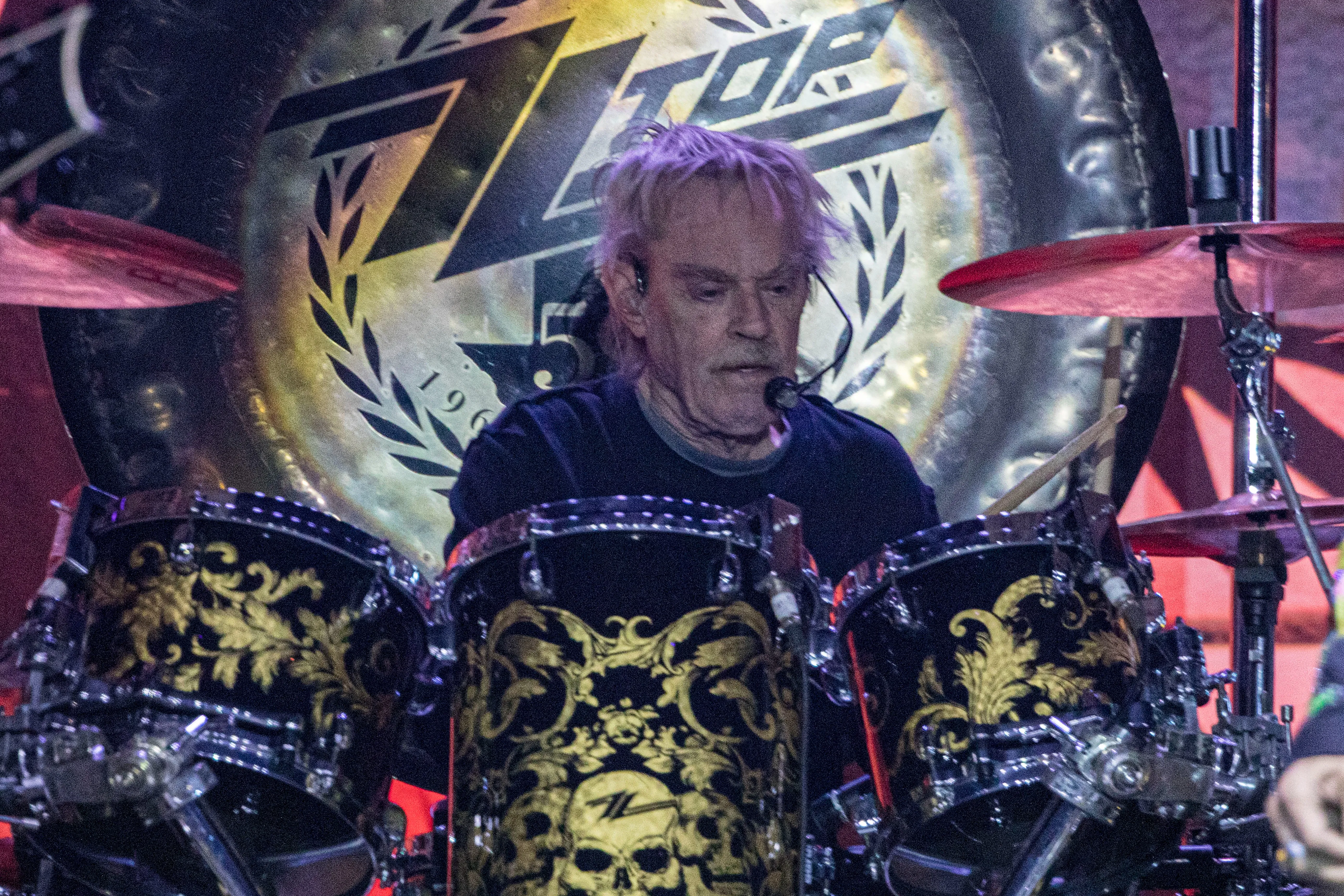 Frank Beard of ZZ Top performs on stage.