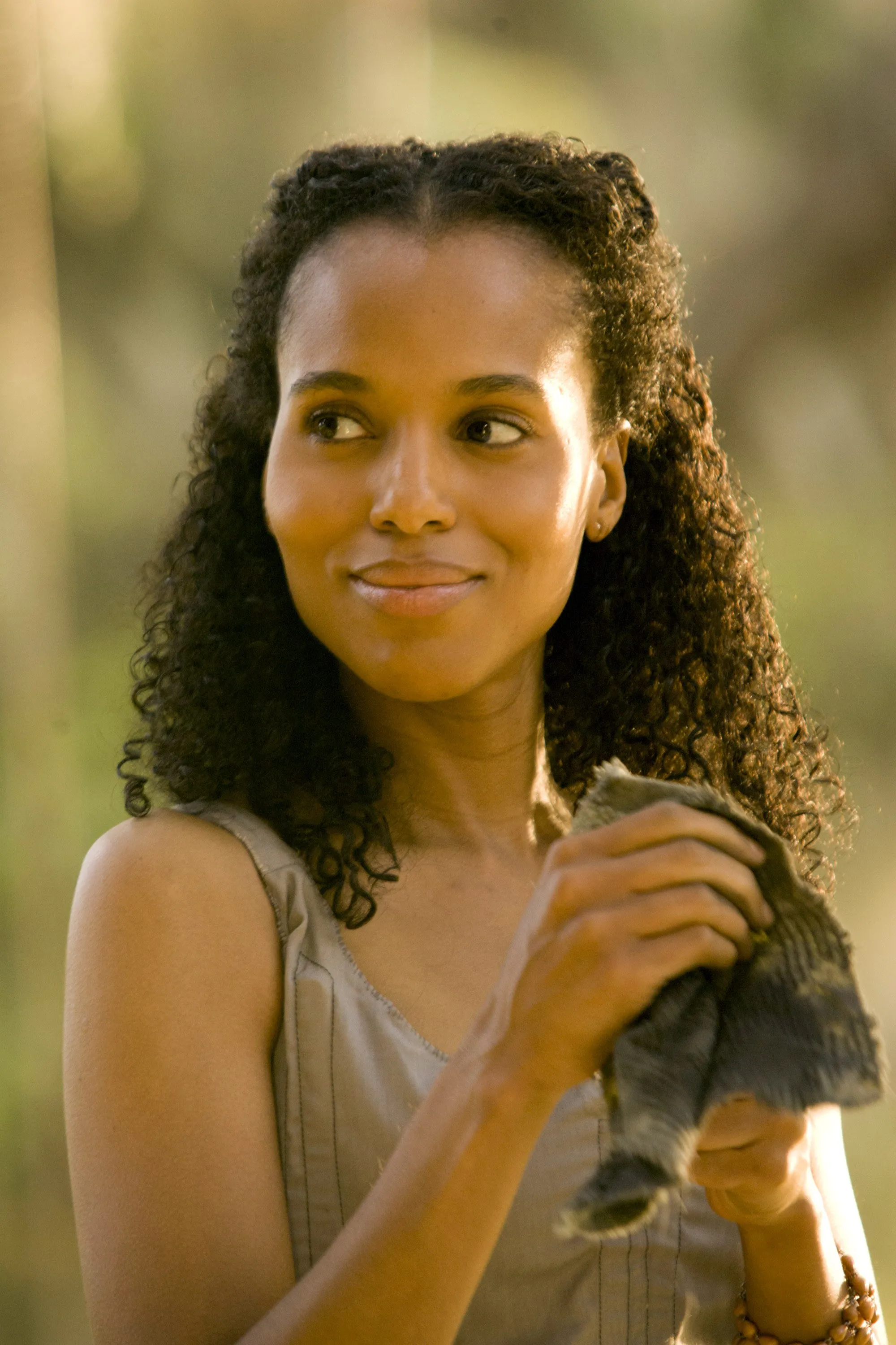 Kerry Washington as Broomhilda von Shaft in a close-up outdoor shot, looking to her right while holding a piece of cloth.