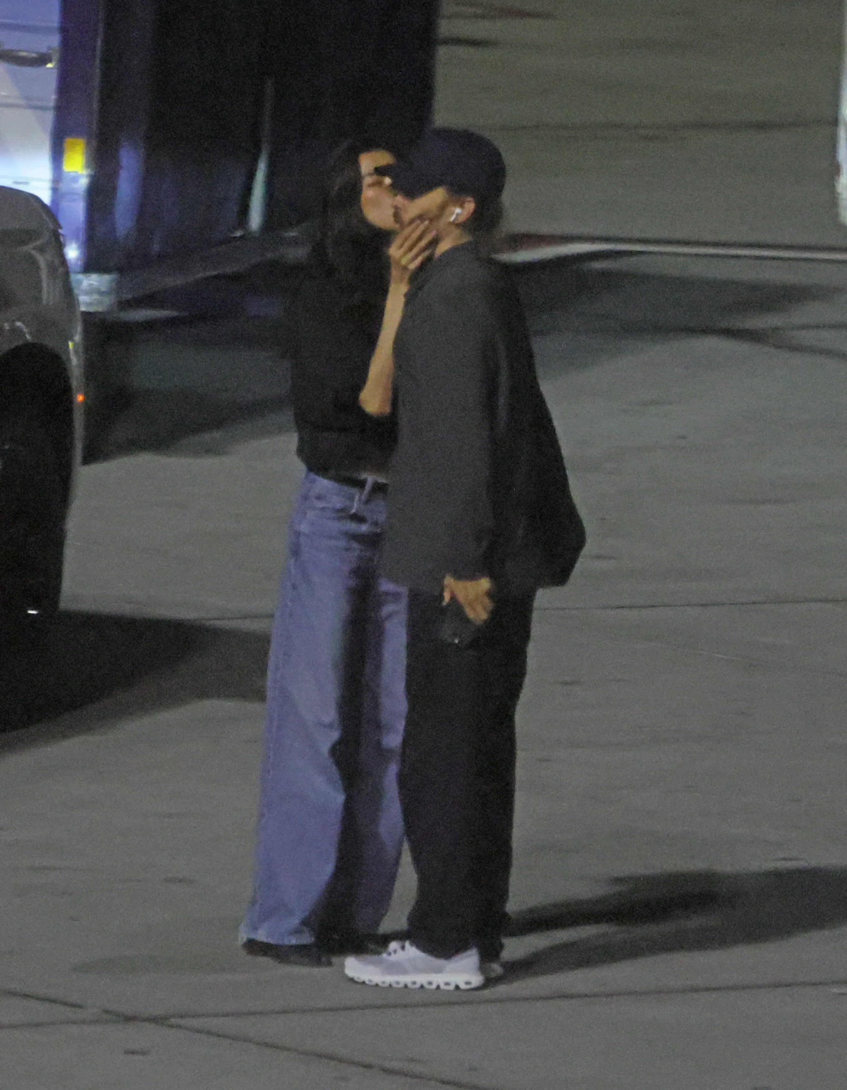 Jared Leto and model Thet Thinn sharing a kiss at LAX.