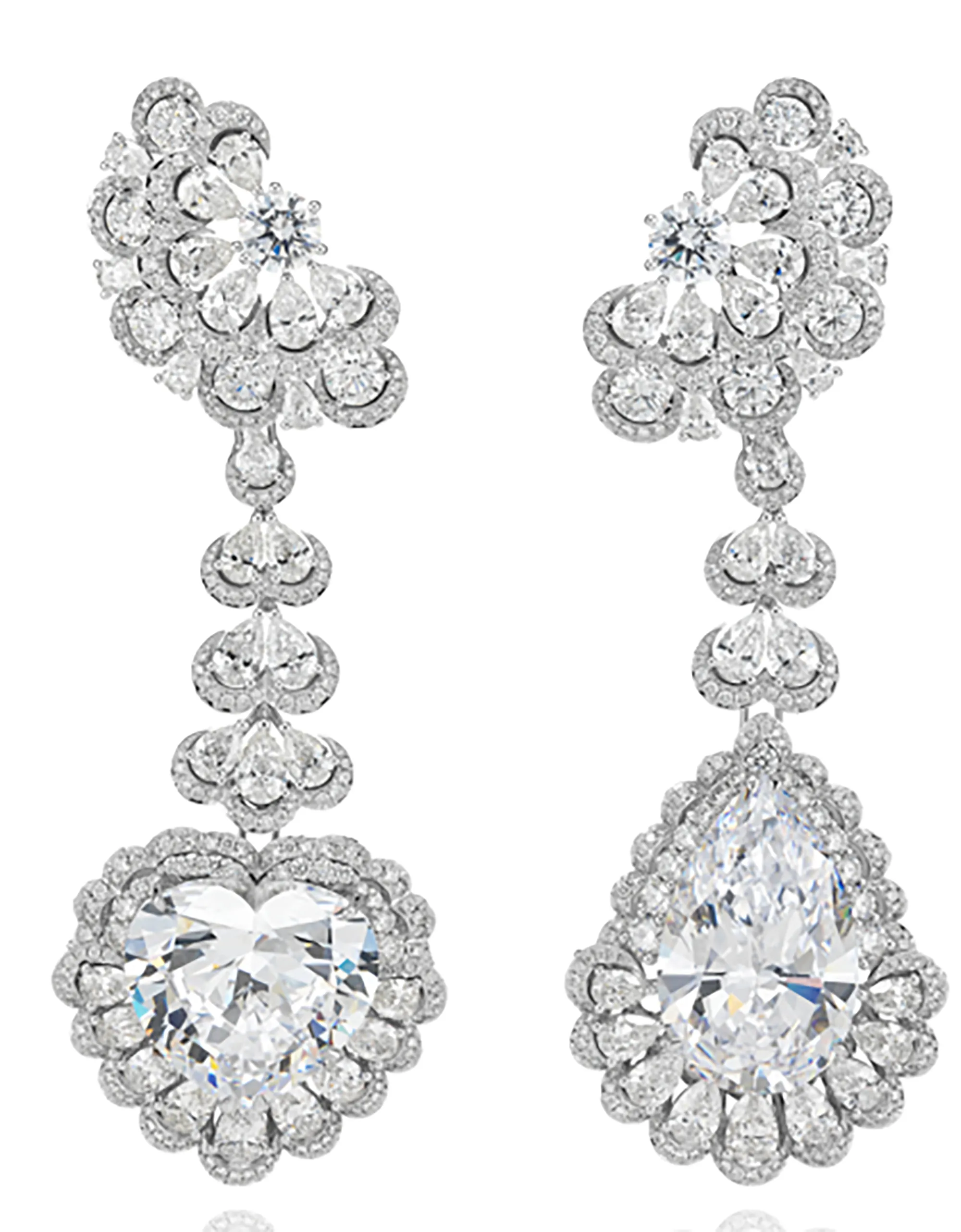 Illustration of two dazzling diamond earrings, one with a heart-shaped diamond and the other with a teardrop diamond, both surrounded by smaller diamonds.