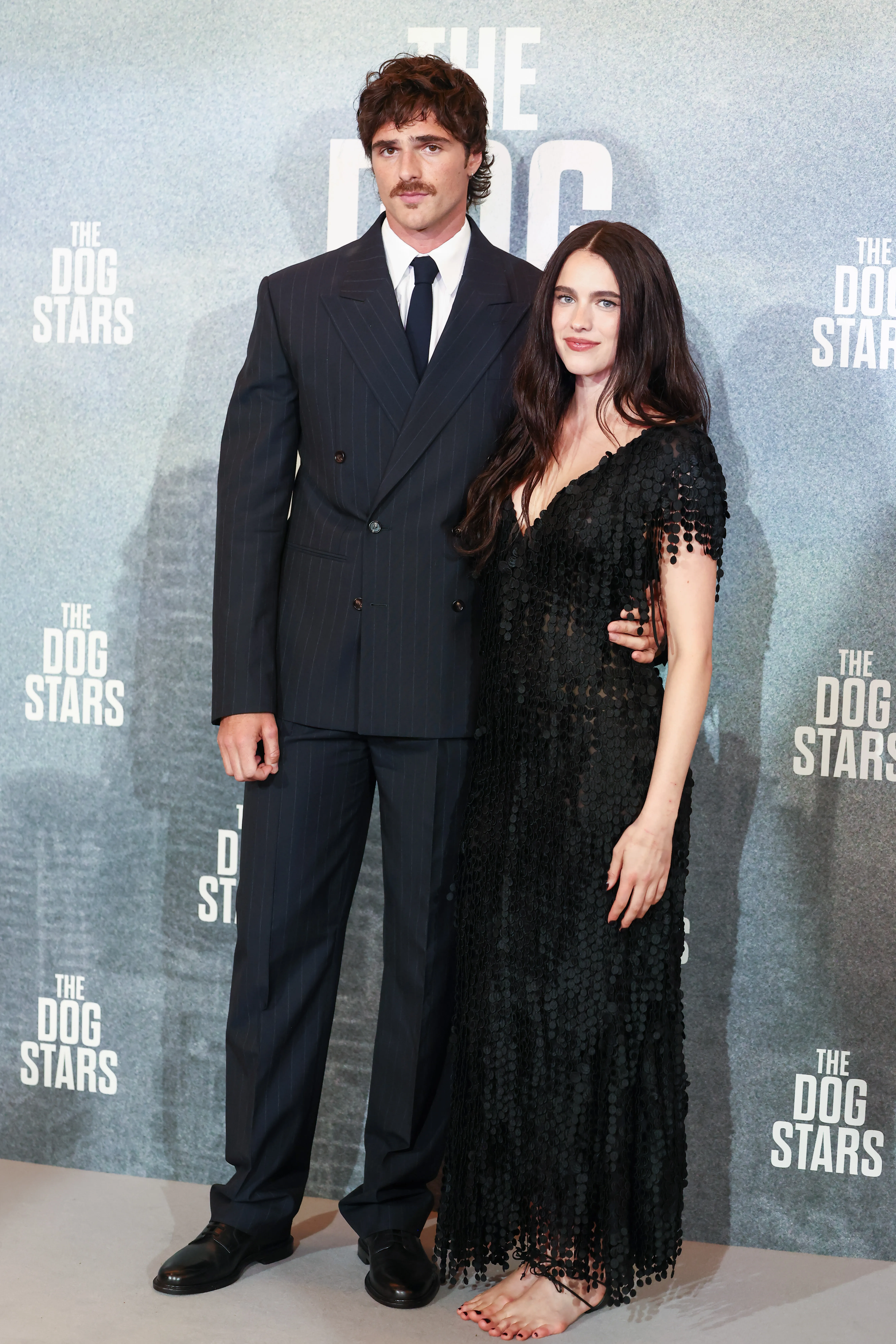 Jacob Elordi and Margaret Qualley pose for photographers at the premiere of