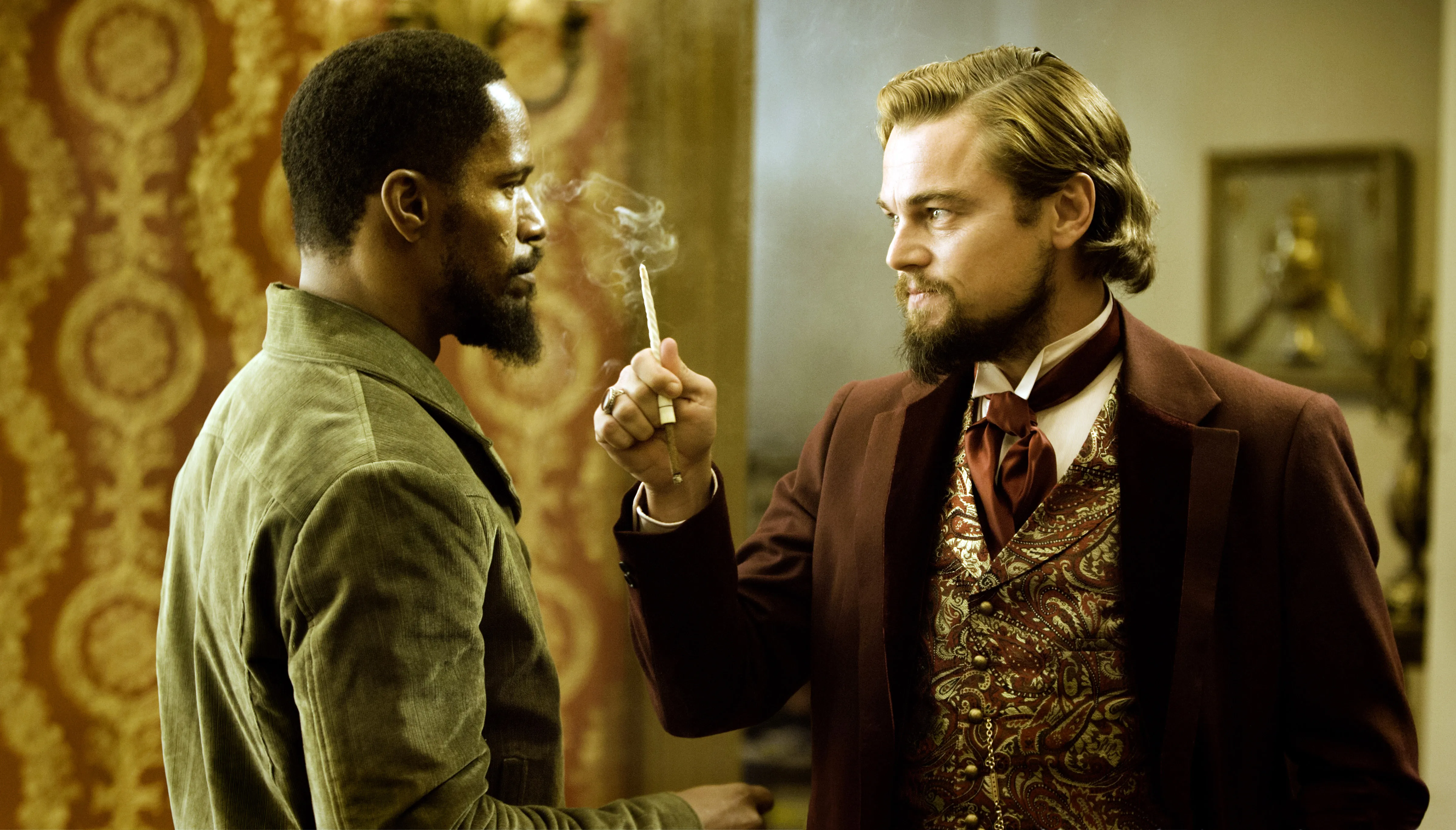 Jamie Foxx and Leonardo DiCaprio face to face in period clothing.