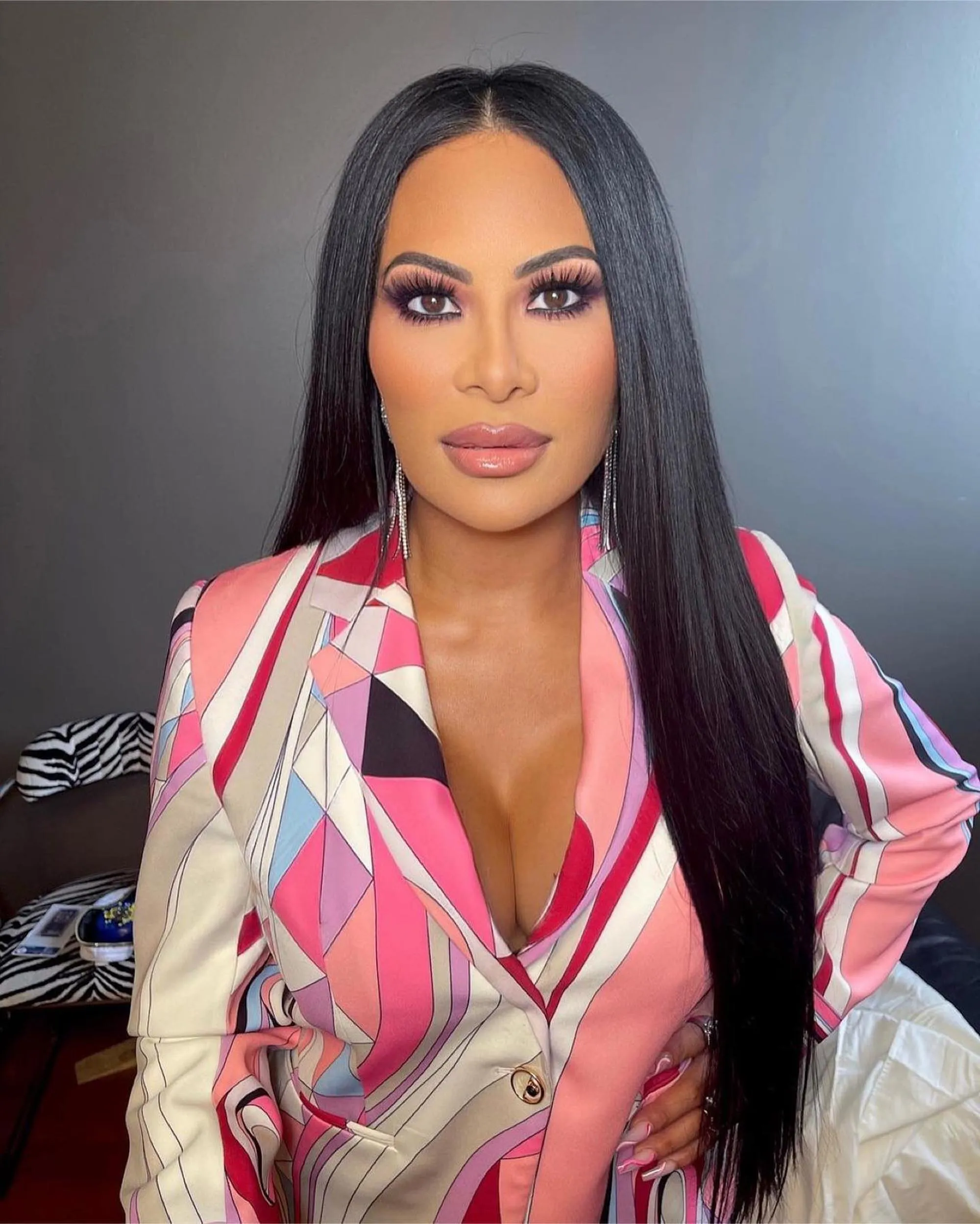 Jen Shah in a colorful patterned blazer.