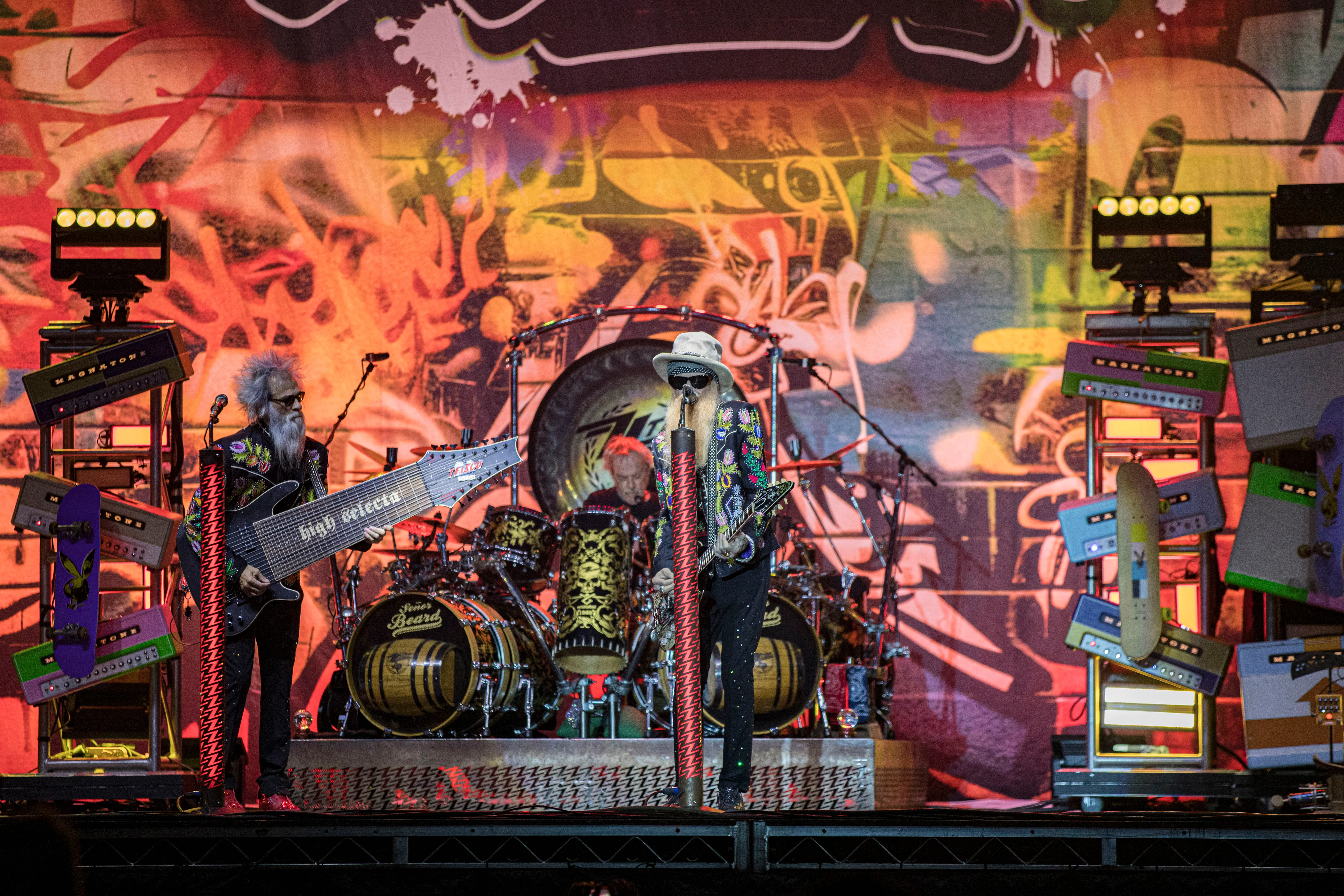 ZZ Top performing live on stage.