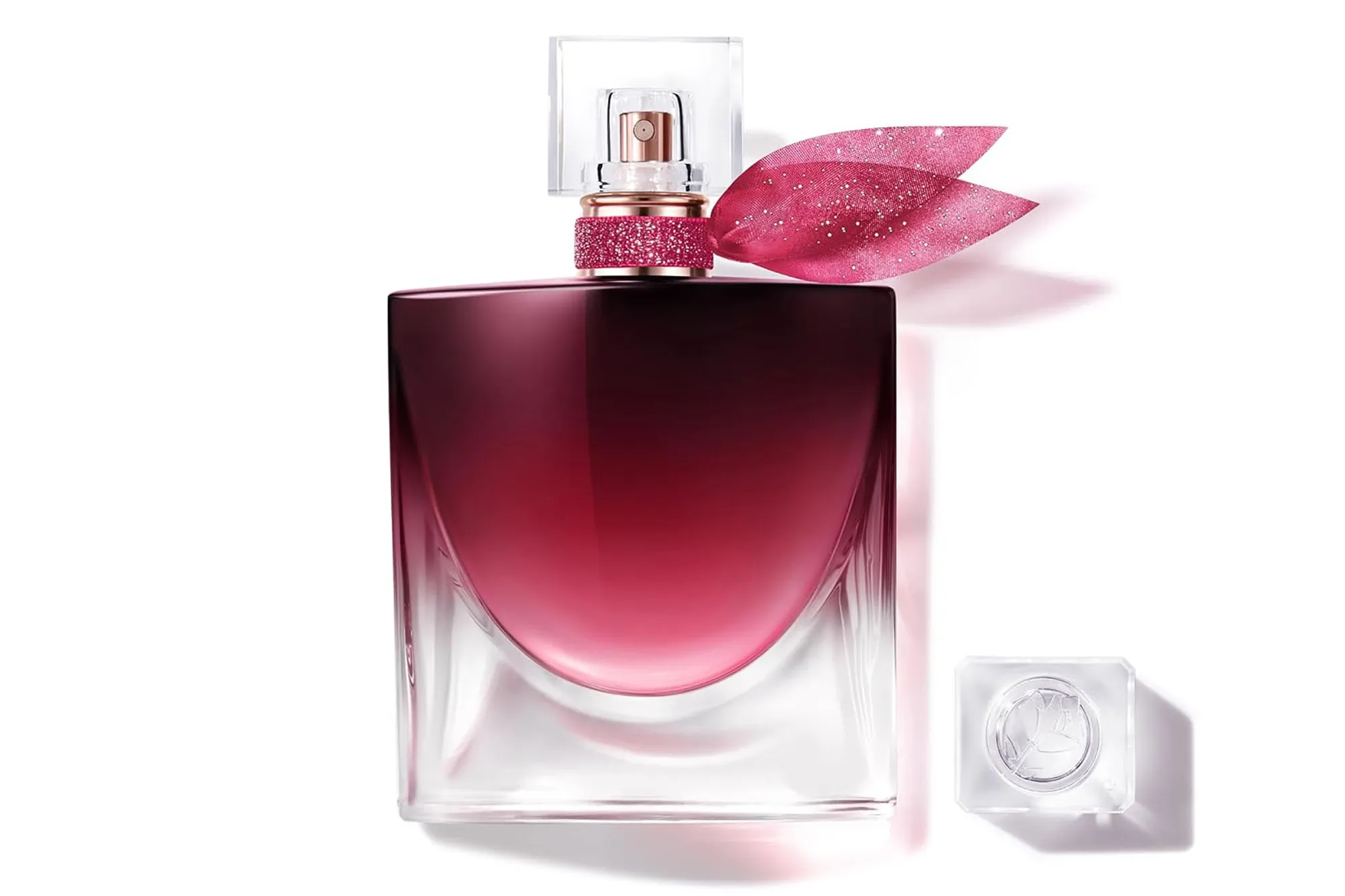 Lancôme La Vie Est Belle perfume bottle with glittery pink ribbon.