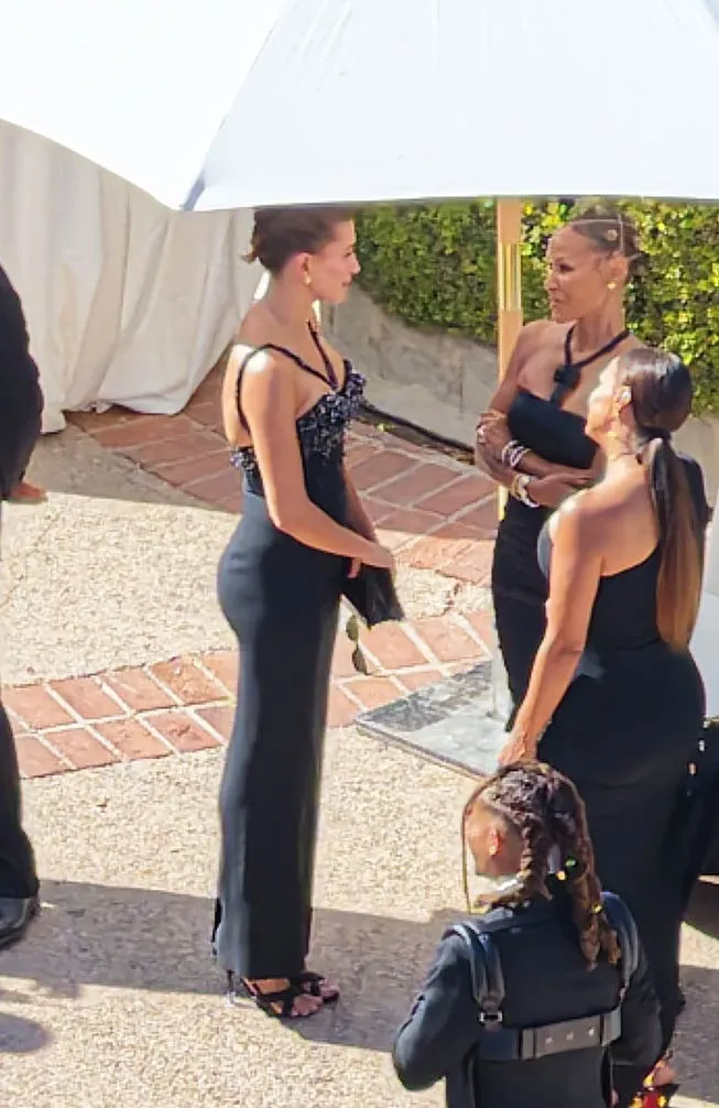 Hailey Bieber speaking with Jada Pinkett Smith at Jordyn Woods and Karl-Anthony Towns