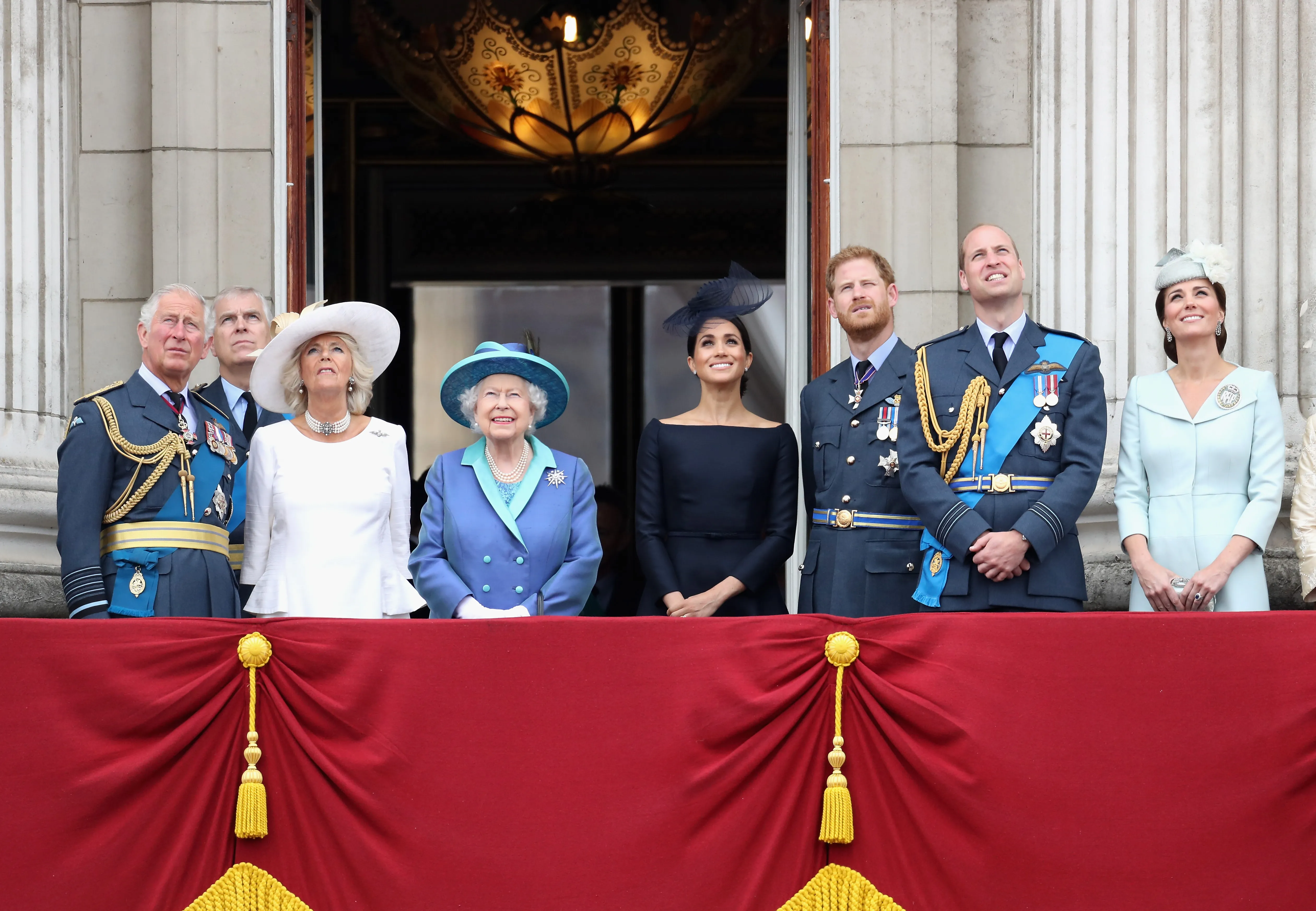 Members of the Royal Family on the Buckingham Palace balcony during an RAF flypast.
