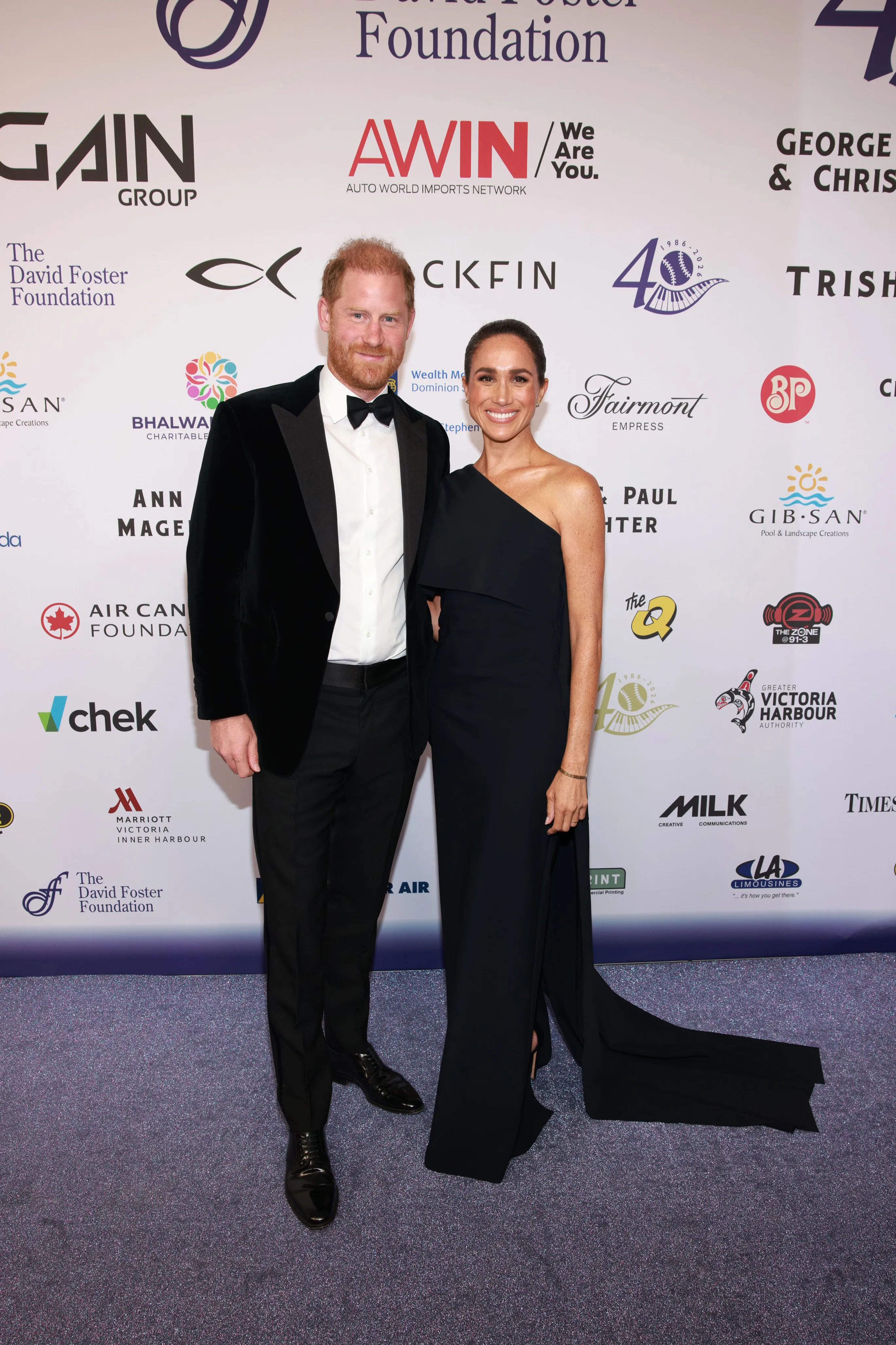 Prince Harry and Meghan Markle pose at the David Foster Foundation 40th Anniversary Celebration.