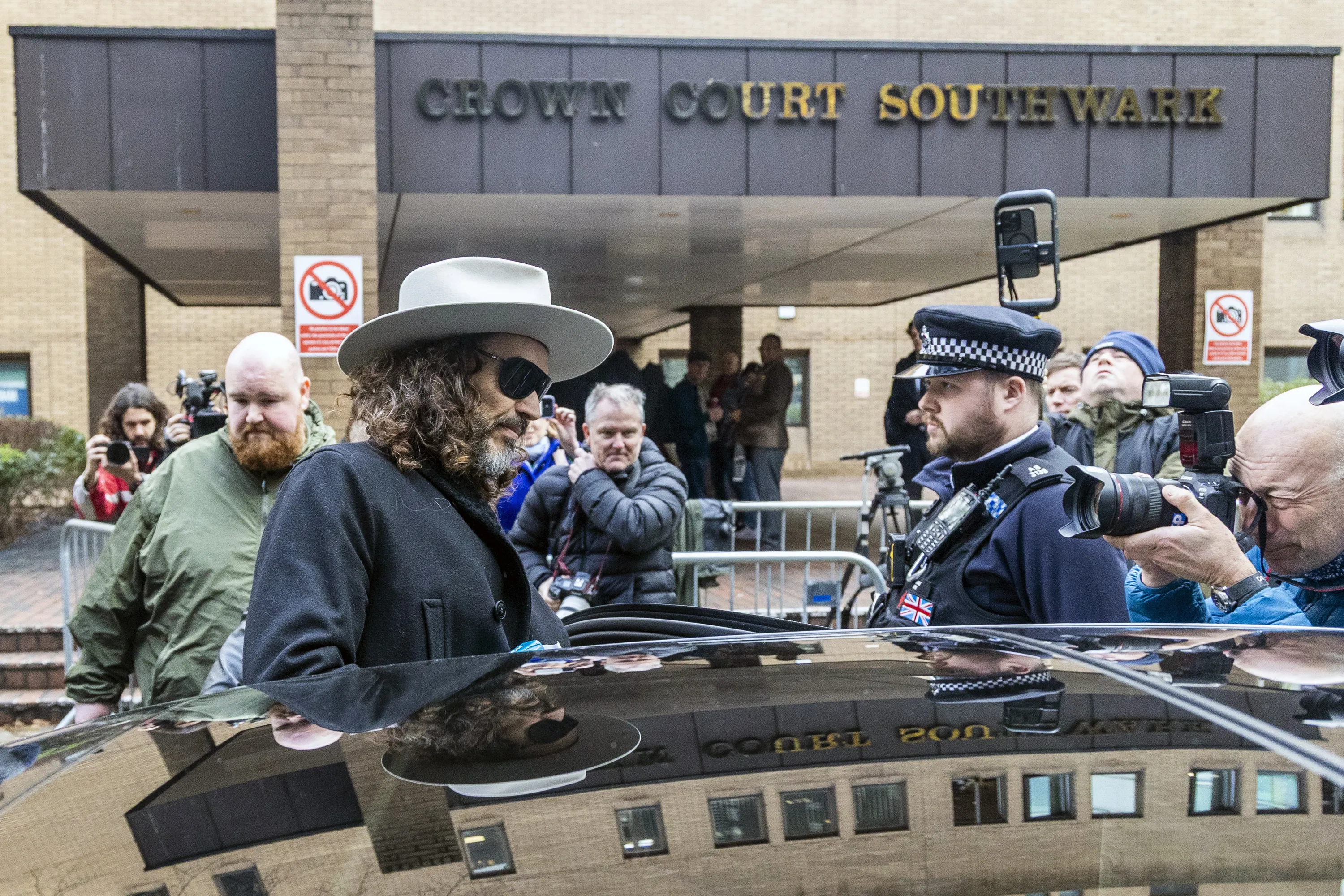Brand, seen here leaving a London court in February, has pleaded not guilty to multiple rape charges.
