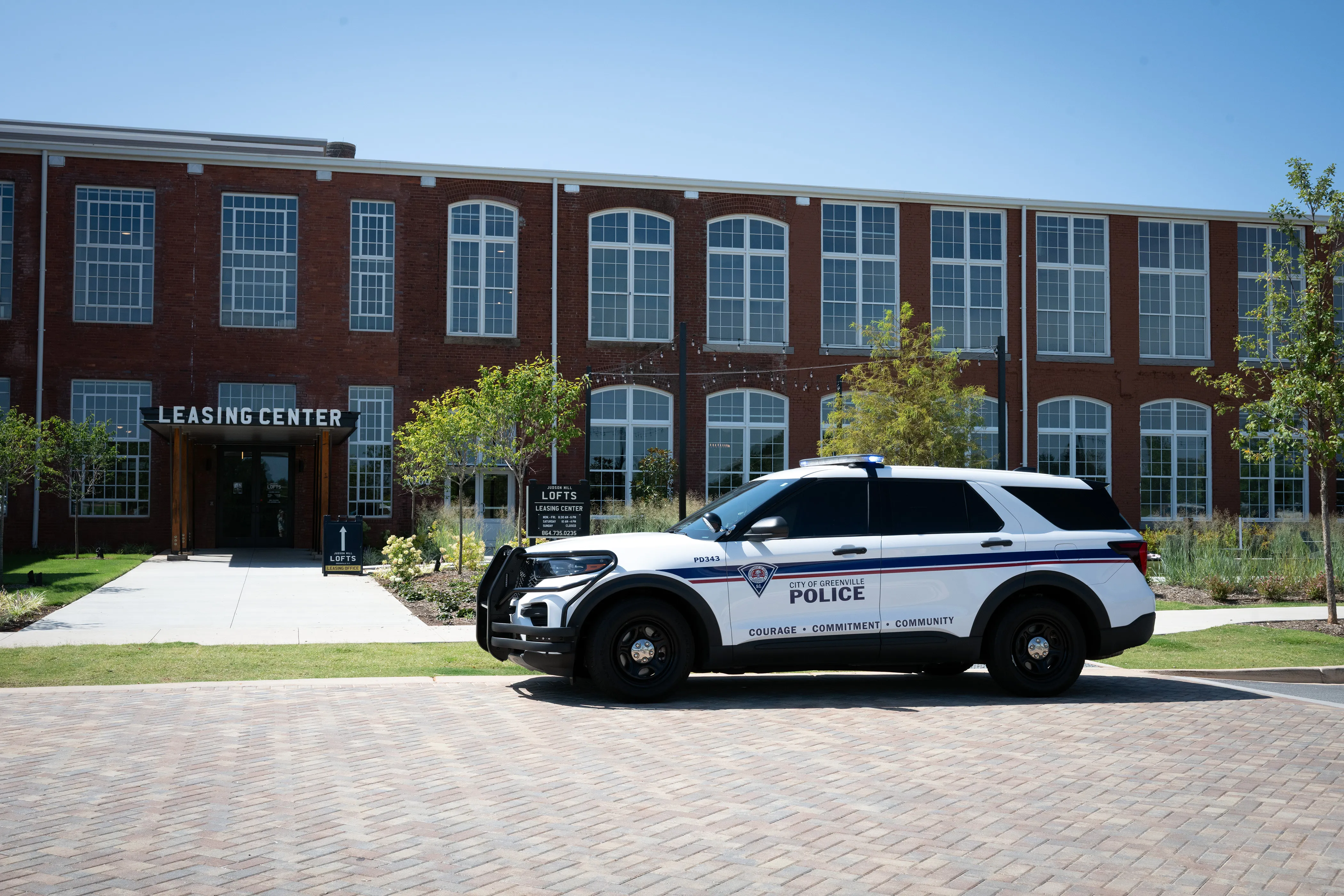 Greenville police vehicle outside the Judson Mill Lofts leasing center.