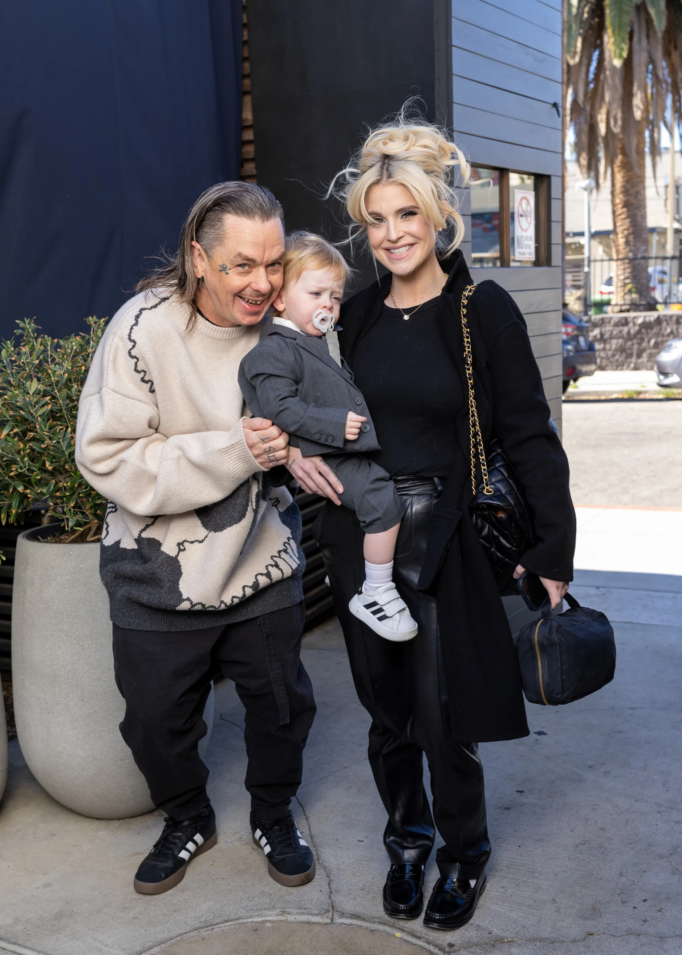 Sid Wilson, Kelly Osbourne and their son Sidney Wilson posing at Sidney Wilson