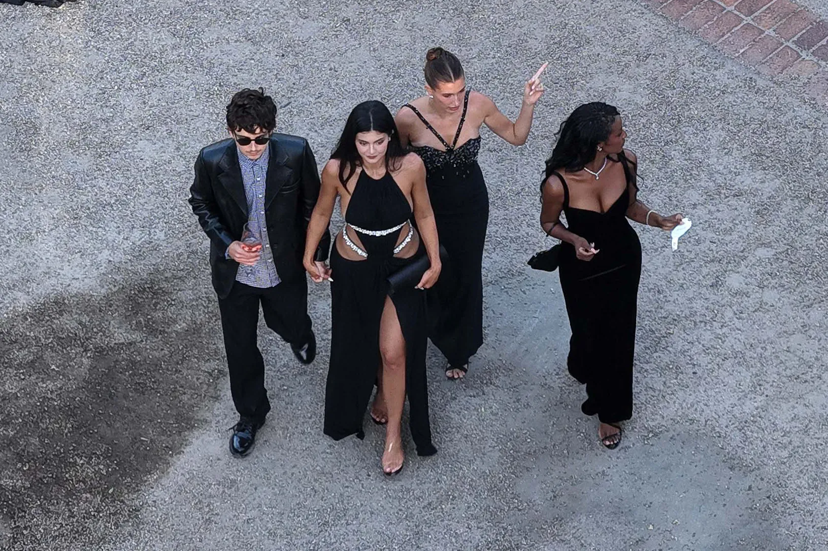 Timothée Chalamet, Kylie Jenner, and Hailey Bieber arriving as guests at Jordyn Woods and Karl-Anthony Towns