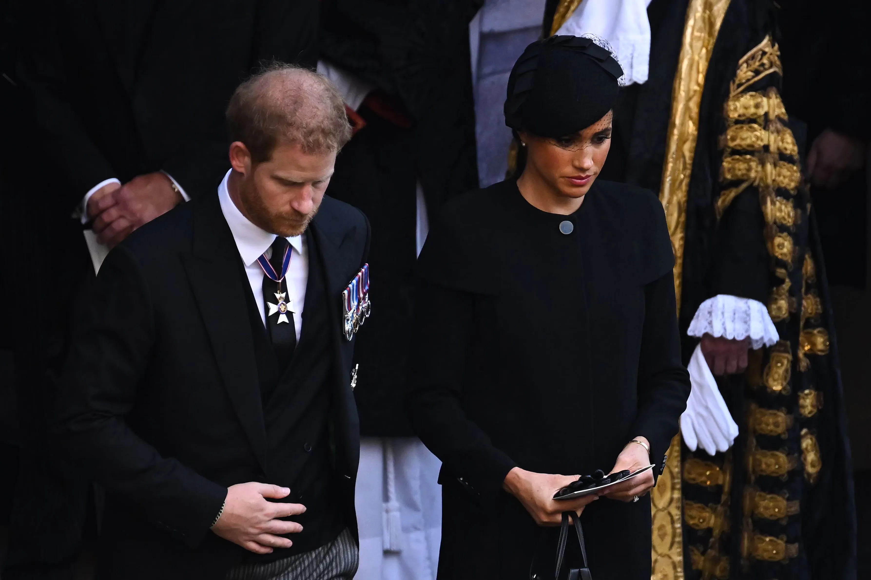 Prince Harry and Meghan Markle at a service for Queen Elizabeth II