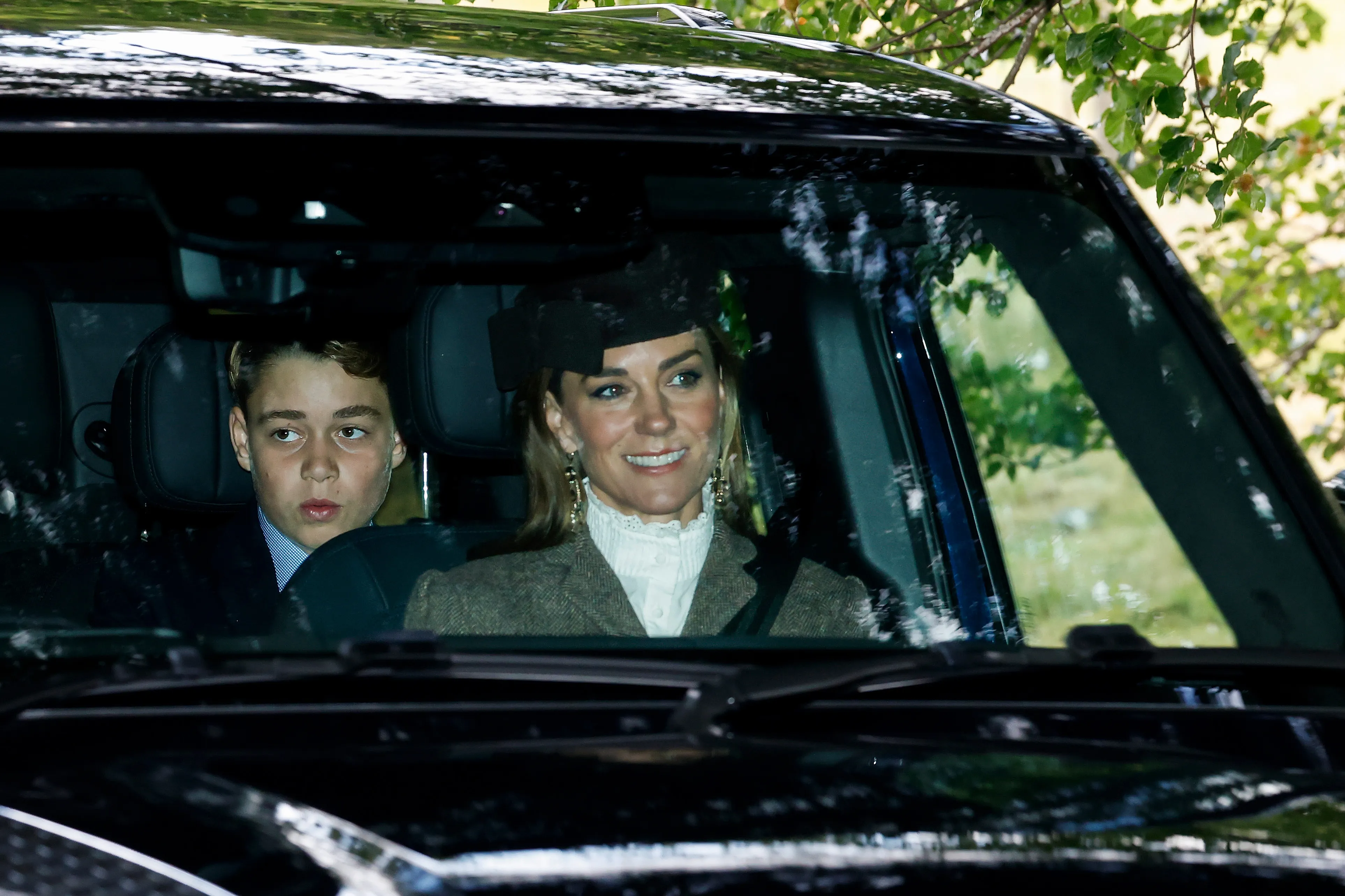 Prince George and Princess Catherine arrive at Crathie Kirk Church.