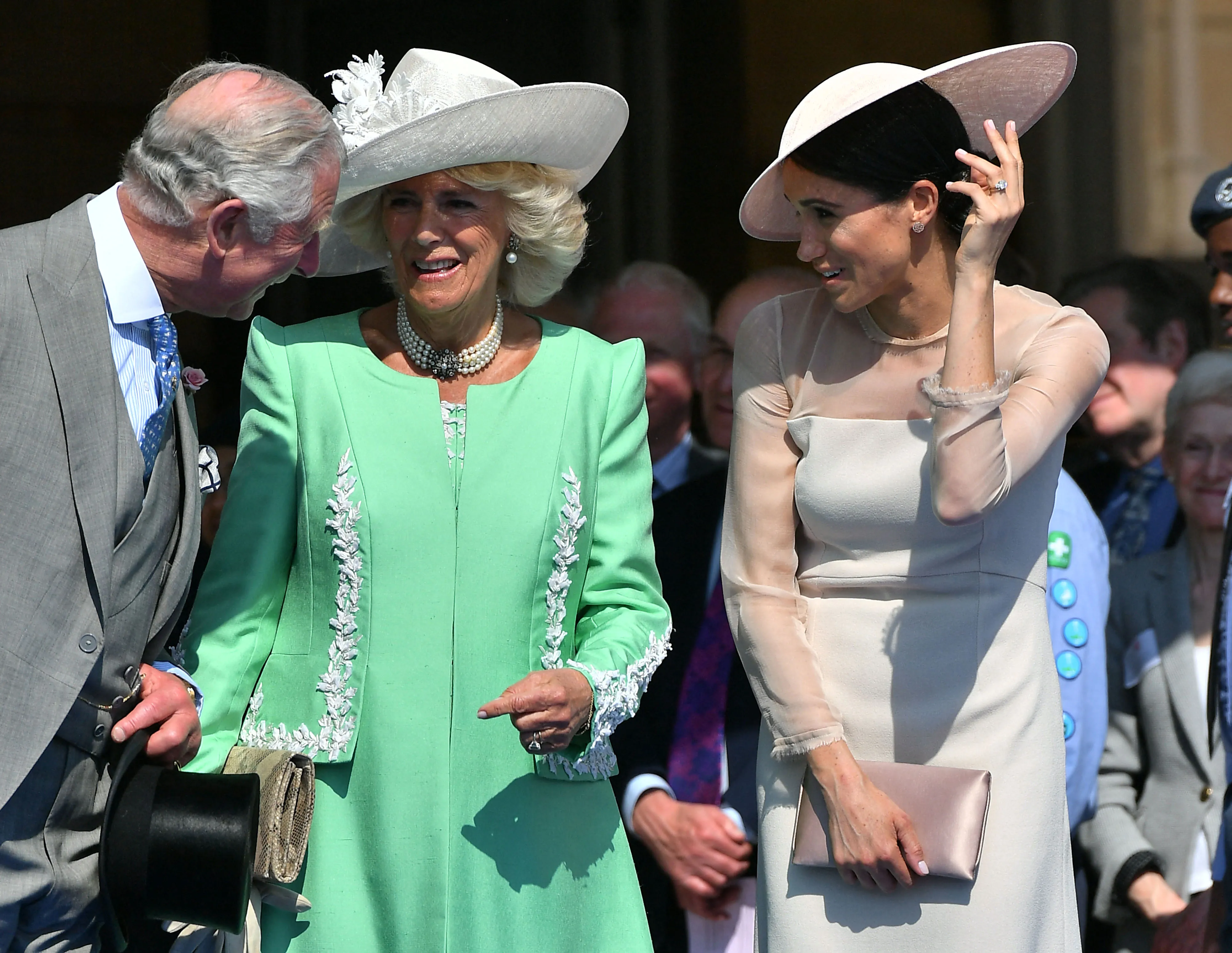 King Charles, Queen Camilla and Meghan Markle