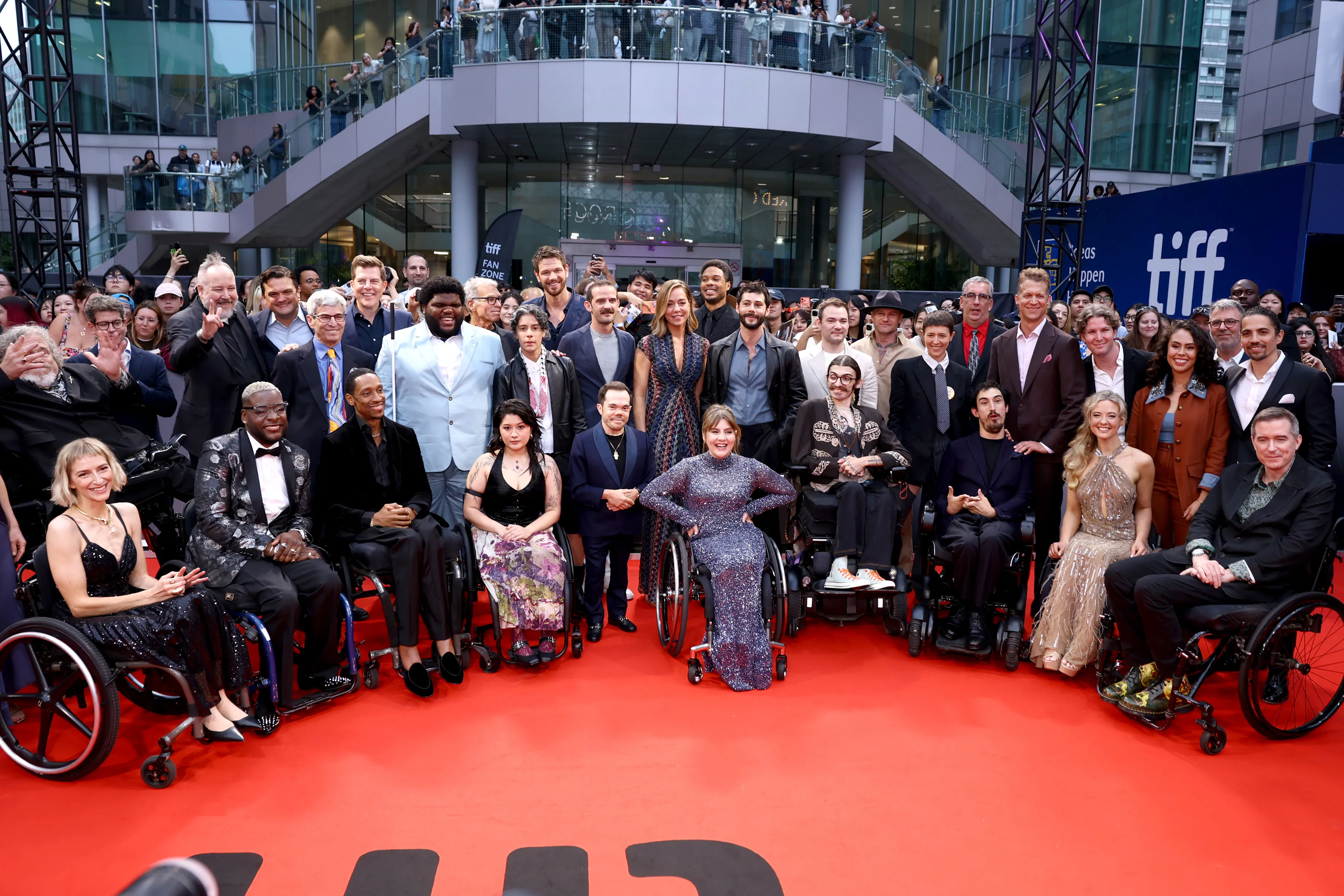 Cast and crew of "Being Heumann" pose at the Toronto International Film Festival.