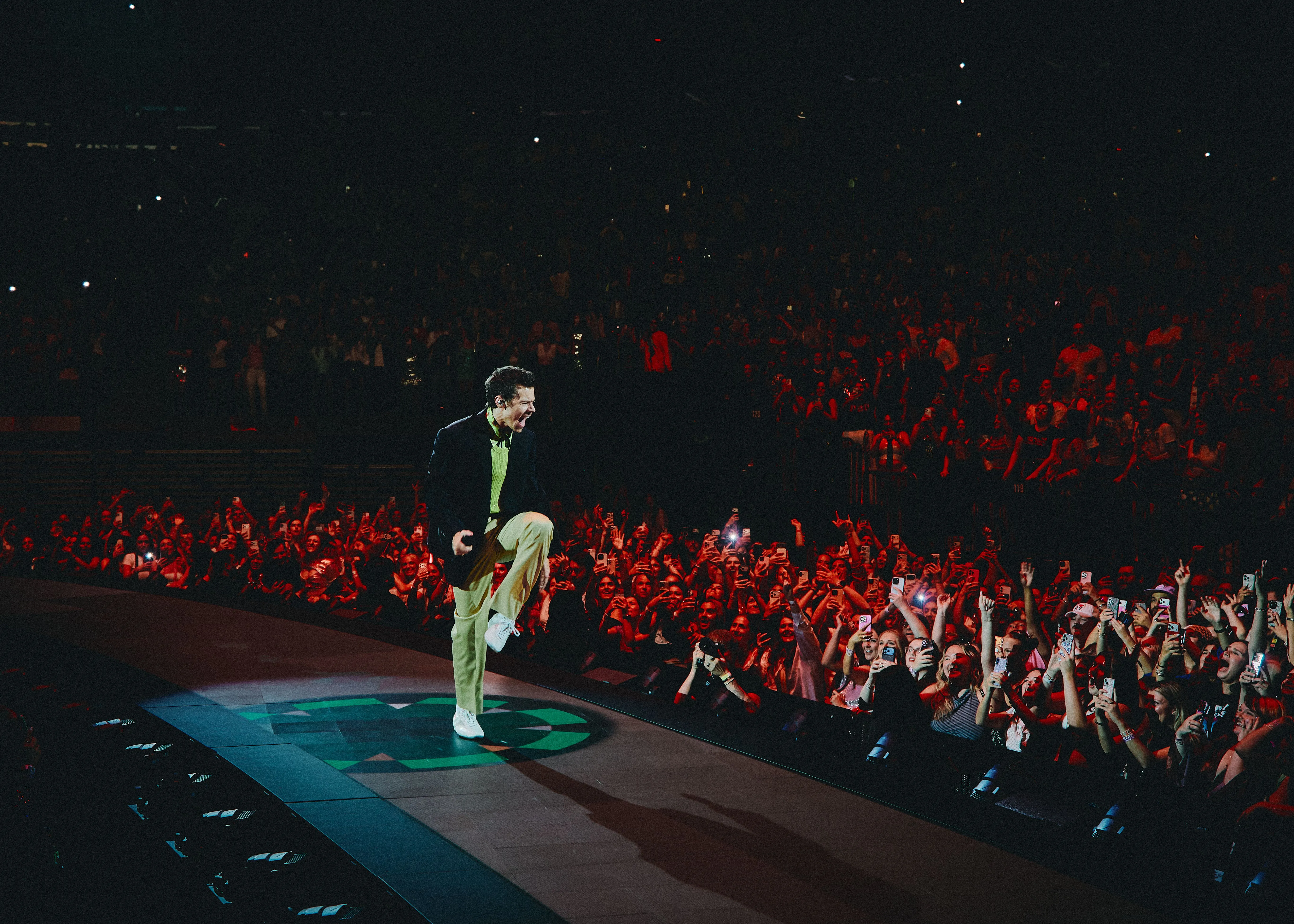Harry Styles performing on stage at Madison Square Garden.