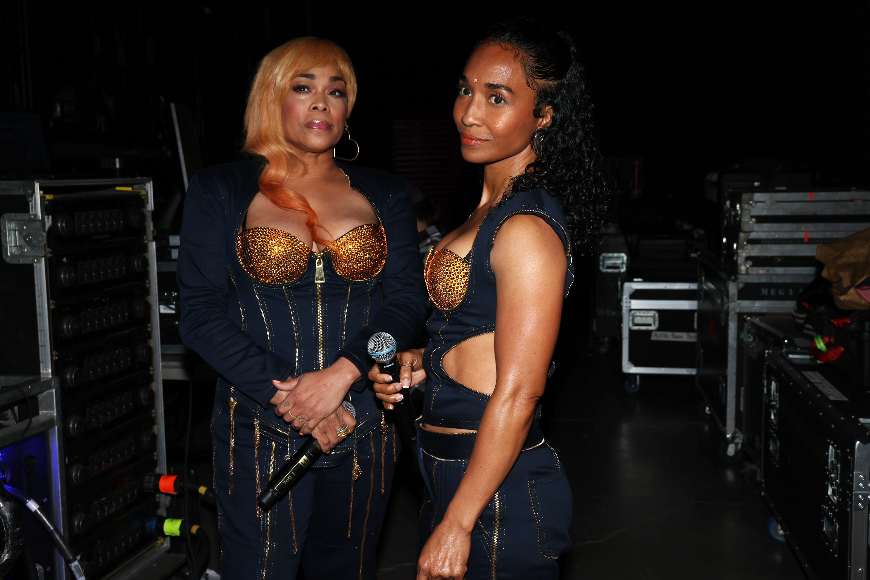 Tionne "T-Boz" Watkins and Rozonda "Chilli" Thomas from TLC pose for a photo.