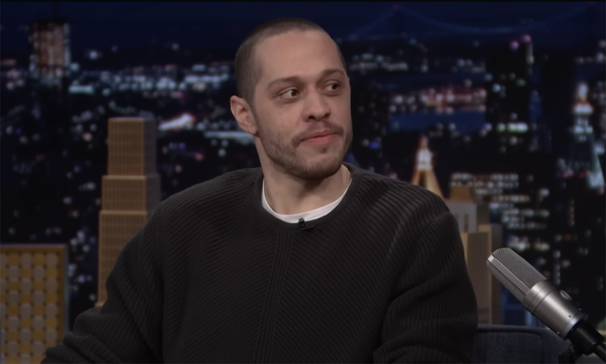 Pete Davidson smiling at an event